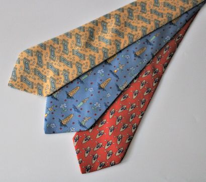 null HERMES, Three silk ties with Thai decorations, flying carpet and kayak, in shades...
