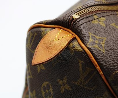 null Louis VUITTON, Handbag Speedy model in leather and canvas monogrammed LV, two...