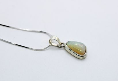 null *925 sterling silver pendant set with a triangle-shaped opal cabochon, on a...