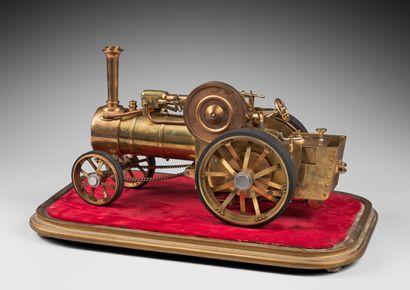 null Modèle réduit de locomotive à vapeur en bronze et cuivre. 
Début XXe. 
H. 19,5...