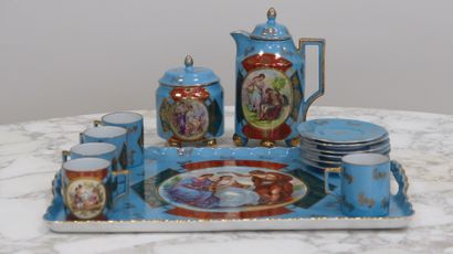 null Service à café, fin du XIXe siècle, en porcelaine à fond bleu et or, à décor...
