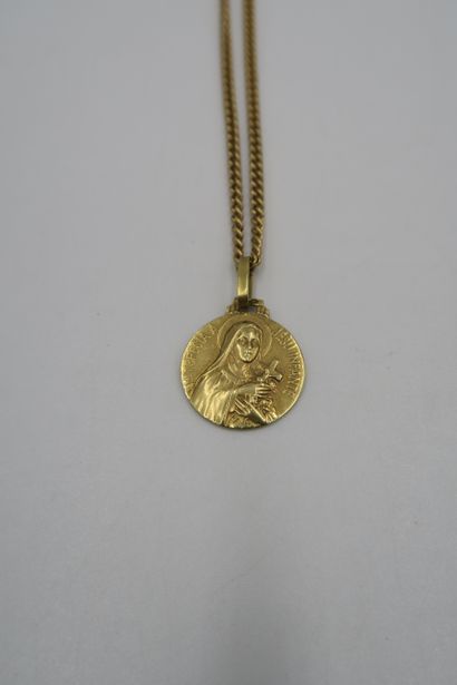 Chain and christening medal featuring a Virgin...
