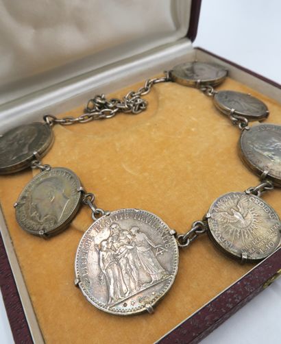 null Silver necklace, composed of a chain holding coins including a 5 francs 1875,...