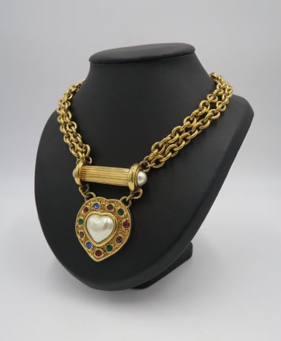 null AGATHA couture necklace in gold-plated metal, featuring a double chain holding...