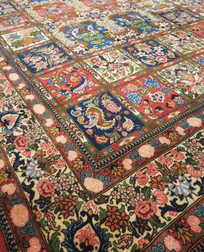 null Iranian polychrome wool carpet with stylized flower design
302 x 205 cm