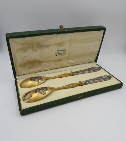 null Set comprising a pair of salad servers in gilt metal with forged silver handles,...