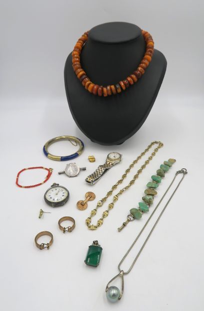 null In a box: fancy set including four gold-plated metal necklaces or chains, a...