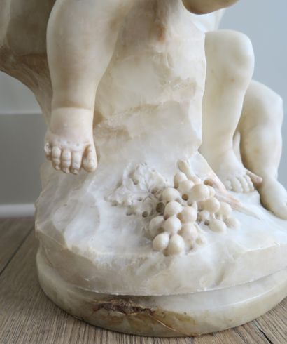 null White marble group depicting two children with grapevines
H. Approx. 49 cm
(The...