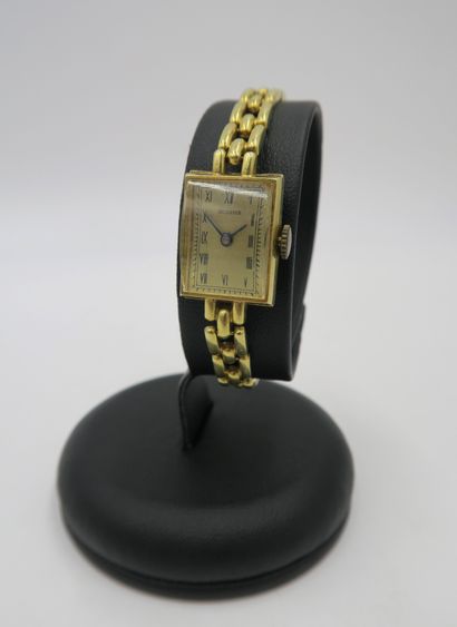 null BUCHERER
Ladies' wristwatch in 18K yellow gold, rectangular case, mechanical...