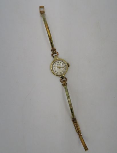 null GIRARD PERREGAUX 
Round-cased ladies' wristwatch in 14K yellow gold, cream dial...