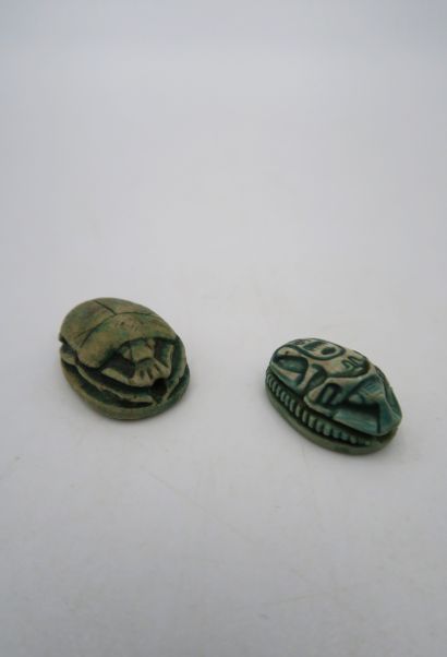 null Set of two scarab beads engraved on the reverse, one with a scarab and the other...