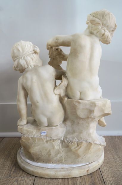 null White marble group depicting two children with grapevines
H. Approx. 49 cm
(The...
