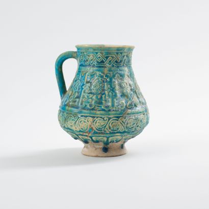 Pichet turquoise au bandeau épigraphié 
Eastern Iran, probably Bamiyan or Nichapur,...
