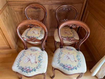 null Suite of four chairs with openwork backs in natural wood covered with music...