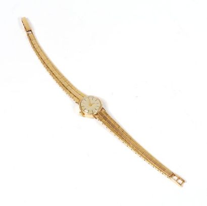 null 18K yellow gold 750‰ bracelet watch, the round dial with cream background (slightly...