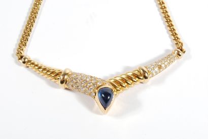 null Necklace in 18K yellow gold 750/000 decorated with a sapphire cabochon and a...