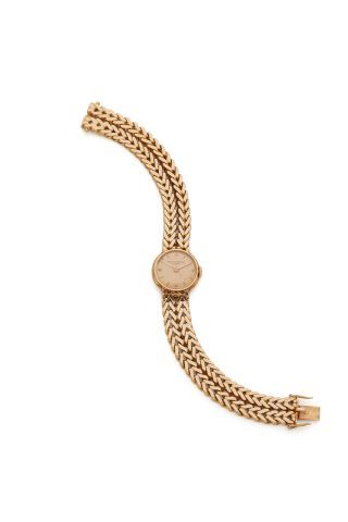 null PATEK PHILIPPE Geneva 

Ladies' wristwatch in 18K yellow gold 750‰, round dial...