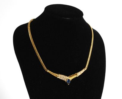 null Necklace in 18K yellow gold 750/000 decorated with a sapphire cabochon and a...