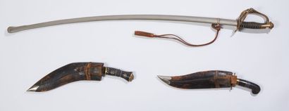 null Set including : 

- Officer's saber 

- Two Algerian daggers