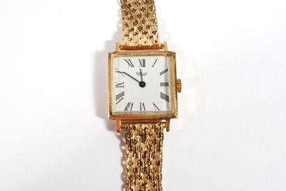null 18K yellow gold 750‰ wristwatch, the rectangular dial signed ORLY, the bracelet...