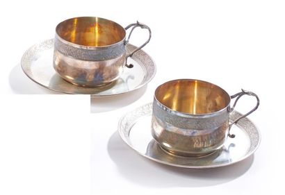 null Pair of silver tea cups and their saucer 925‰ with laurel branch frieze decoration,...