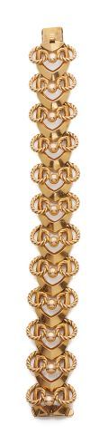 null Articulated bracelet in 18K yellow gold 750‰, the articulated links with motifs...