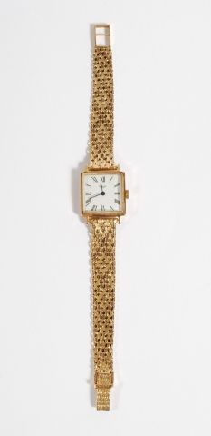 null 18K yellow gold 750‰ wristwatch, the rectangular dial signed ORLY, the bracelet...