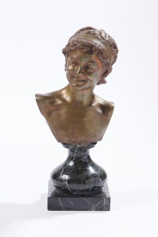 null After Auguste PARIS (1850-1915) 

A bronze bust of a faun with a medallion patina...