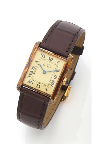 null MUST by CARTIER 

Tank wristwatch, the case in vermeil, the dial with cream...