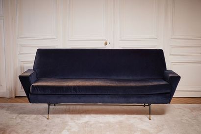 null Sofa in midnight blue velvet resting on a black lacquered metal base with small...