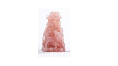 null Vase en quartz rose sculpté à décor de phénix surmonté d'un couvercle.

Chine,...