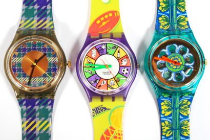 null SWATCH 

Lot of three SWATCH water resistant watches; one with a tartan pattern,...