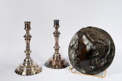null Set including : 



A pair of silver plated torches, the shaft in baluster resting...