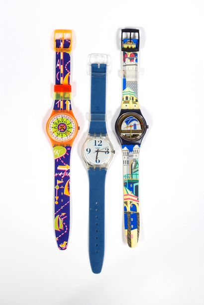 null SWATCH

Lot of three SWATCH water resistant watches; one blue, one architectural...