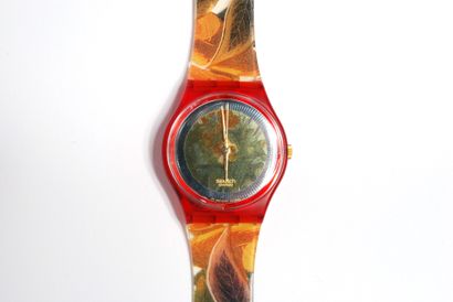 null SWATCH 

Lot of three SWATCH water resistant watches; one orange, one with autumn...