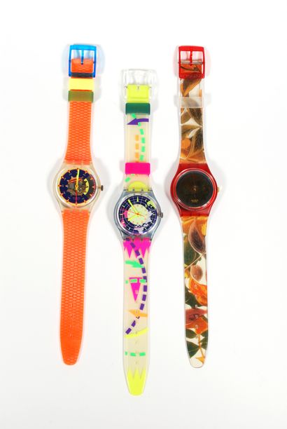 null SWATCH 

Lot of three SWATCH water resistant watches; one orange, one with autumn...