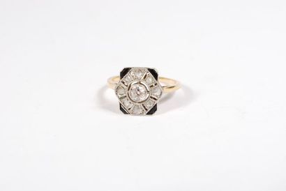 null 18K yellow and white gold Art Deco ring set with a central diamond in a diamond-shaped...