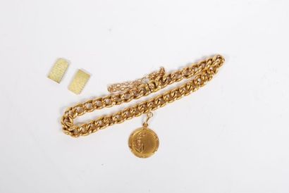 null Lot including bracelet and medal in yellow gold 18K 750/000 and two gold pieces...