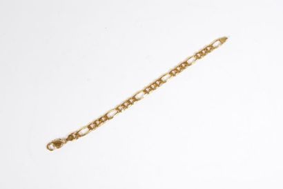 null Bracelet in yellow gold 18K 750/000 with articulated links gourmette 

Weight...