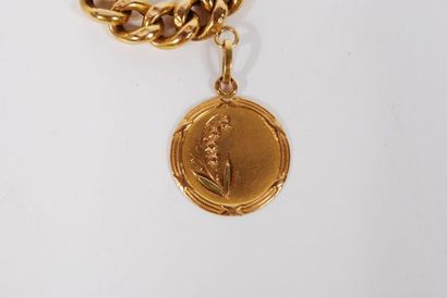 null Lot including bracelet and medal in yellow gold 18K 750/000 and two gold pieces...