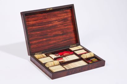 null Rectangular box in inlaid veneer and its content of tokens 

19th century 
...