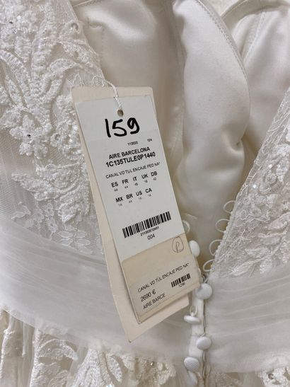 null * Robe de mariée AIRE BARCELONA modèle CANAL

Taille : 44

Prix de vente : 2690...