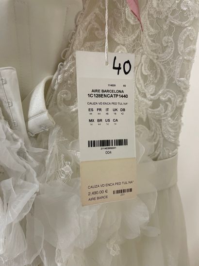 null * Robe de mariée AIRE BARCELONA modèle CALIZA

Taille : 44

Prix de vente :...