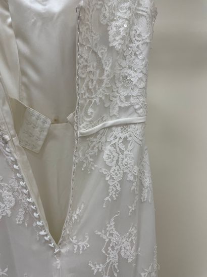 null * Robe de mariée ALMA NOVIA modèle FINIA

Taille : 38

Prix de vente : 2190...