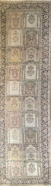 null Gallery carpet with cream background and black border with arcatures in squares...