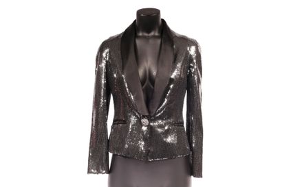 null * Lot of clothing with sequins and sequins including :

- a pantsuit

- a tunic...