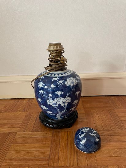 null China 

Porcelain vase and lid with floral decoration in blue underglaze 

Marked...