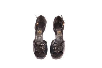 null * FENDI 

Pair of sandals in black calfskin, heart in sequins and baguette beads...