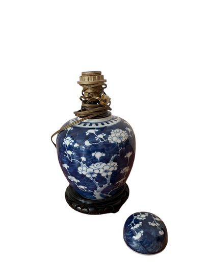 null China 

Porcelain vase and lid with floral decoration in blue underglaze 

Marked...