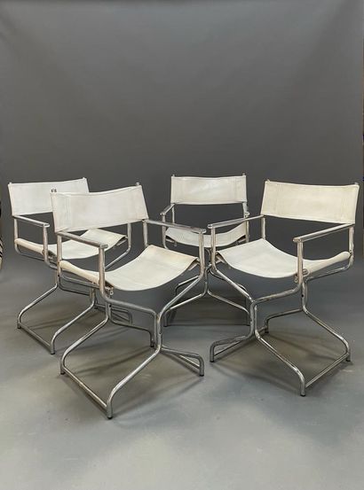 null Suite of four armchairs "director", white leather seats and backs, tubular uprights

Wear...